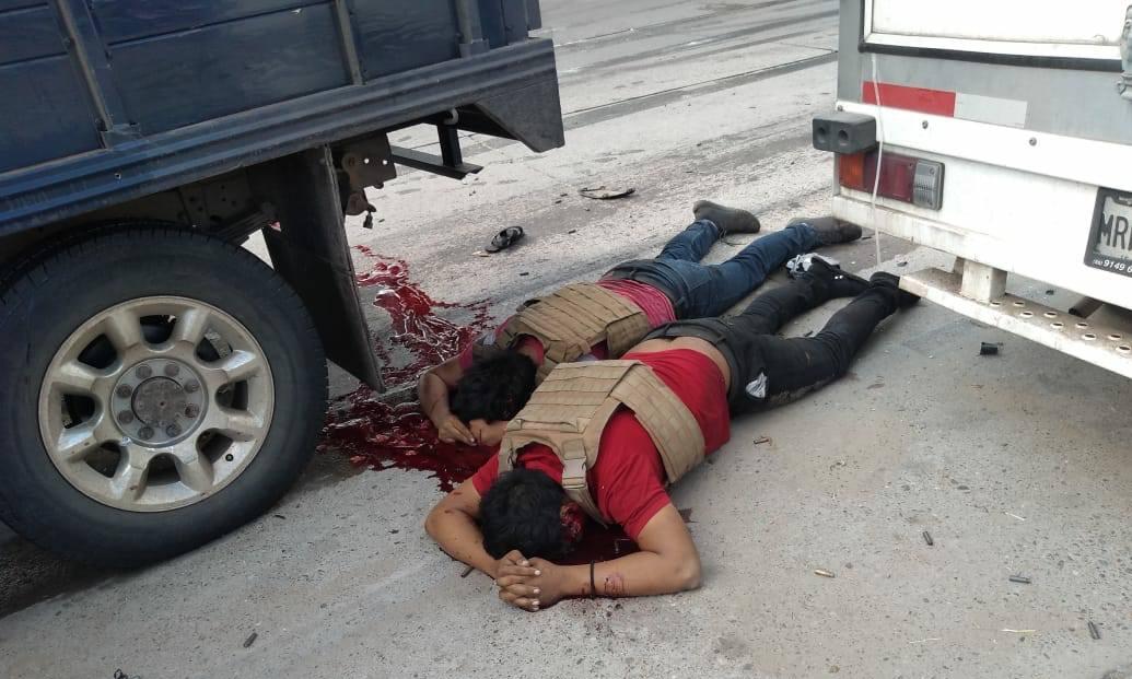 dos civiles muertos